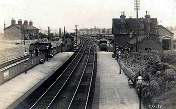 Oakley Station about 1900, with Railway Cottages on the left [Z1130/85]